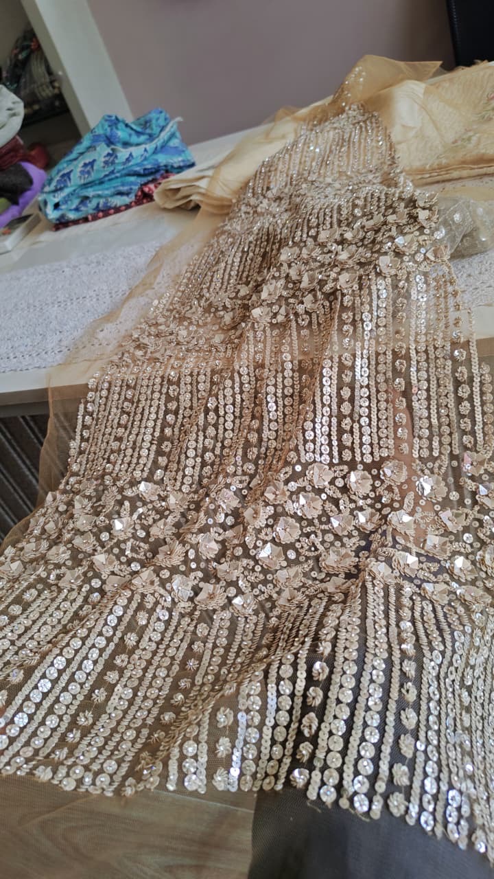 A close study of champagne embroidery and floral embellishment
